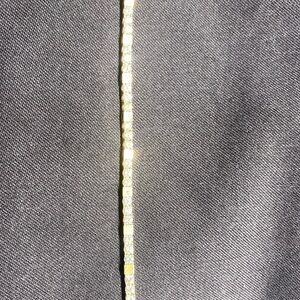 Women’s yellow, gold and diamond tennis bracelet.